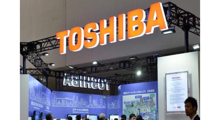 Toshiba shares fall 20% after it flags one-off loss 