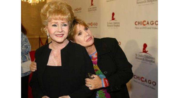 Carrie Fisher's mother Debbie Reynolds dead at 84: reports 