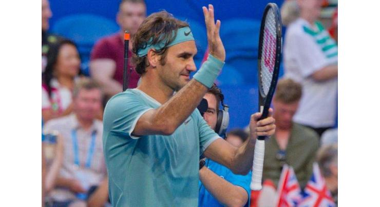 Federer returns in style to beat Evans at Hopman 