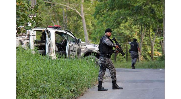 Brazil hunts escaped inmates after bloody prison riot 