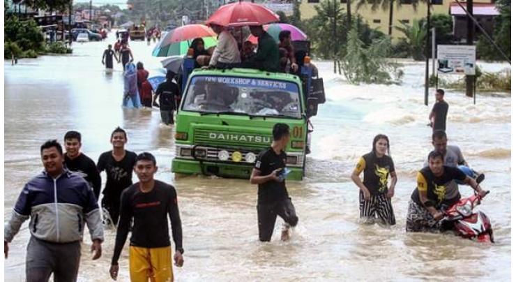 Malaysia floods force 23,000 to leave homes 