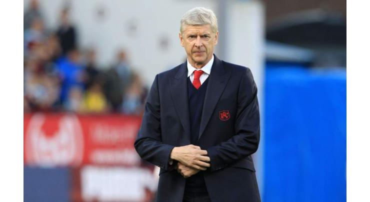 Football: Wenger rues fixture pile-up after Arsenal escape 