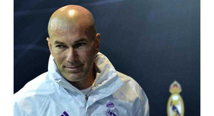 Zidane celebrates flawless year at Madrid 