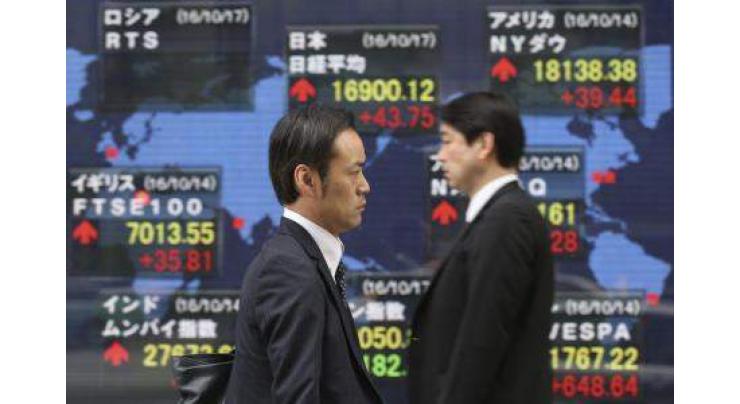 Tokyo shares trade in narrow range 