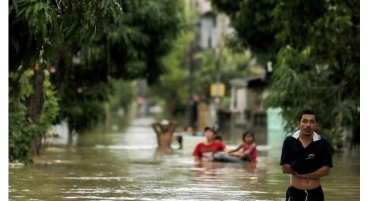 12 dead as torrential rain submerges Thai south 