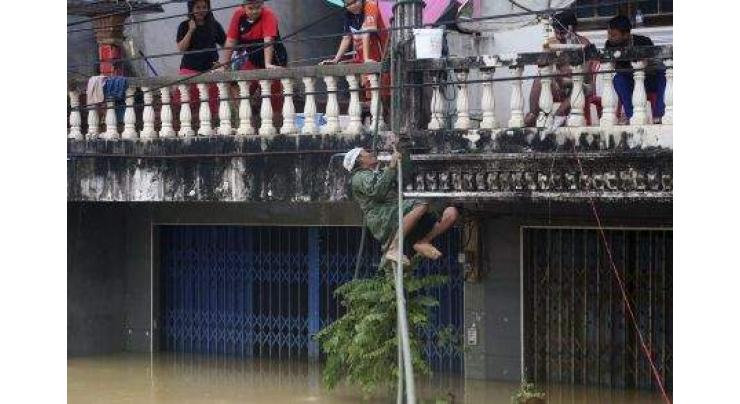 12 dead as torrential rain submerges Thai south 