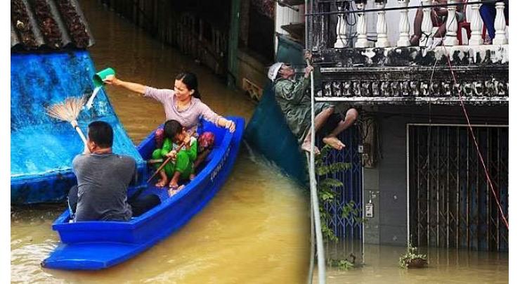 12 dead as torrential rains submerge Thai south 