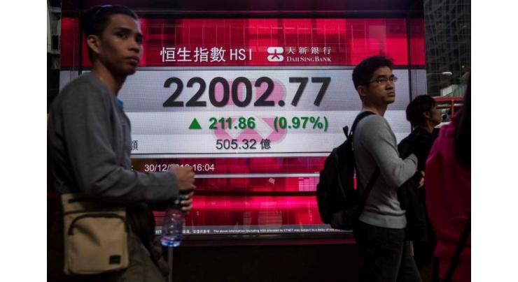 Hong Kong stocks open higher after Wall St record 