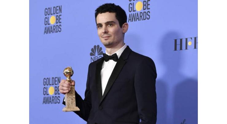 Chazelle wins best director Globe for 'La La Land' 
