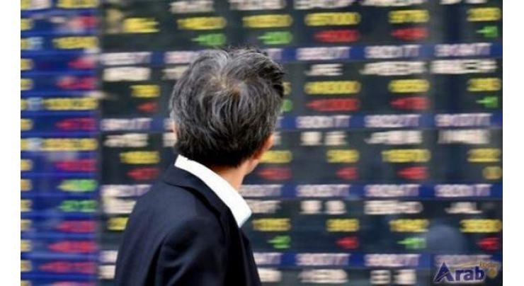 Tokyo stocks close lower as yen rises 