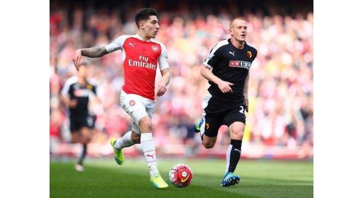 Football: Sanchez rounds off Arsenal romp over limp Swansea 