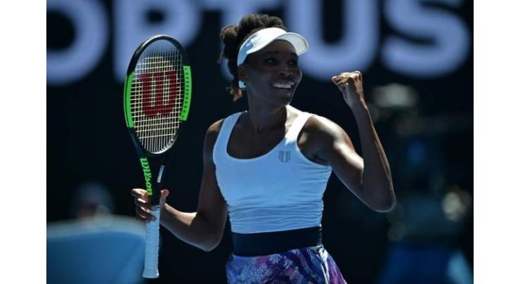 Tennis: Venus bridges age gap to reach round two 