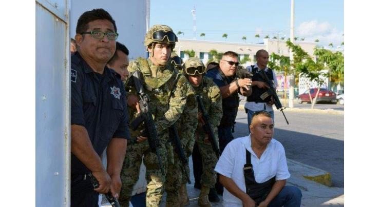 Gunman, two workers killed in attack on prosecutor's office in Cancun: official 