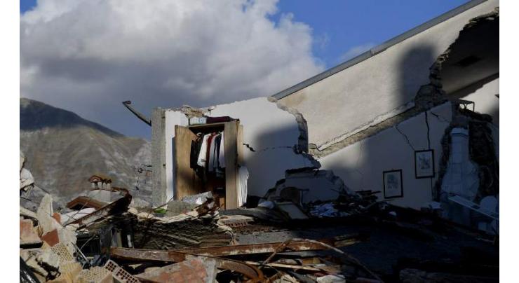 Quake-hit Italy reeling again as Italy hit by quake triple-punch 