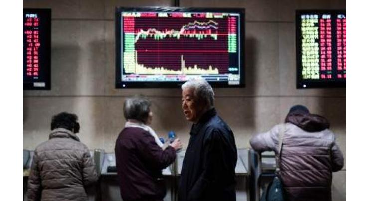 Hong Kong stocks end morning marginally higher 