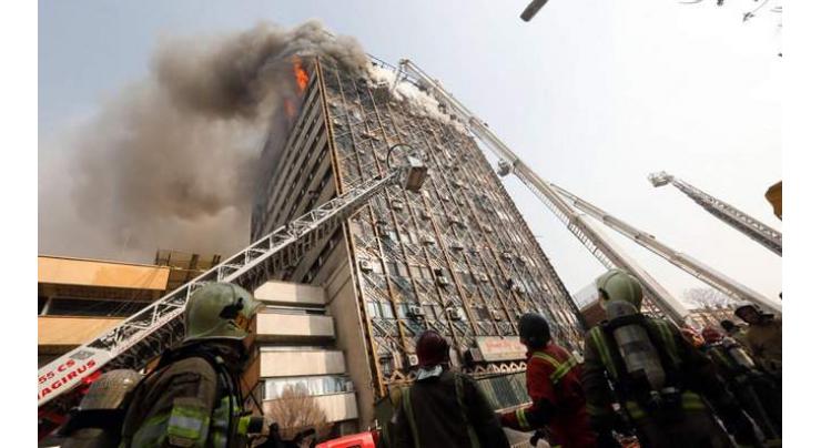 Tehran fire chief praises bravery in tower blaze 