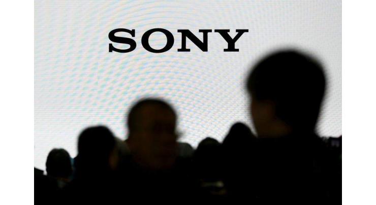 Sony halves forecast as yen, movie unit hammer profit 