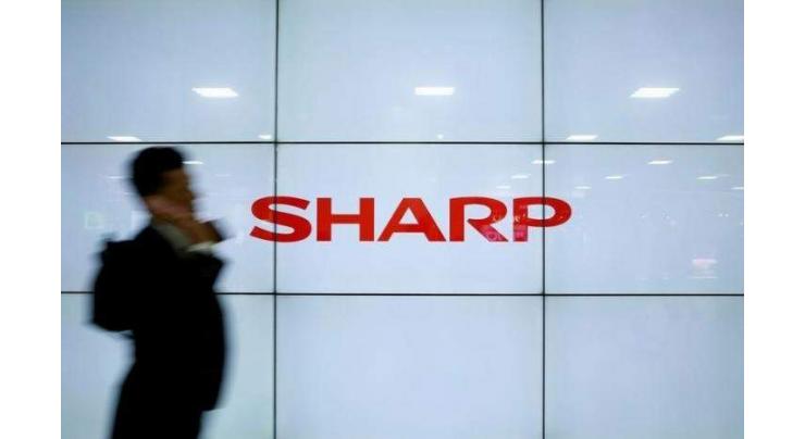 Sharp net loss shrinks more than 60% 
