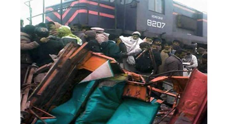 Five killed as train hits rickshaw 