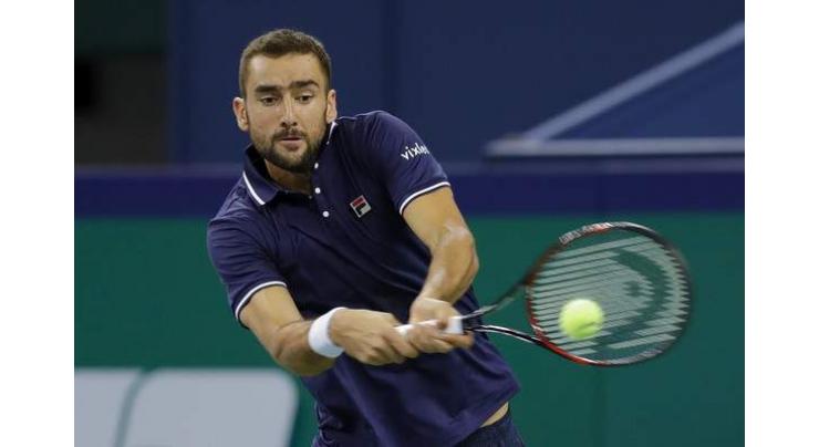 Cilic holds off temperamental Paire 