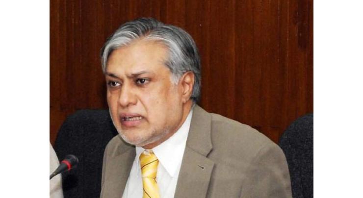 Dar assures K-Electric of settling its issues with govt entities 