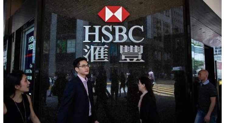 Hong Kong stocks down as HSBC reports profit drop 
