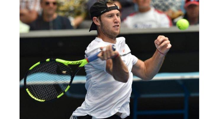 Sock takes Delray Beach title as injured Raonic withdraws 