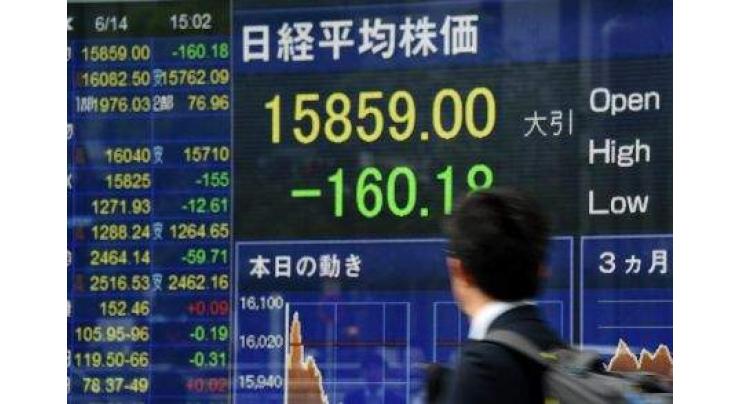 Japan stocks open lower on strong yen 