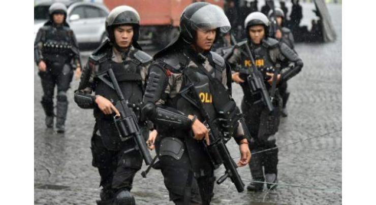 Bomb attack, police shootout in Indonesian city 