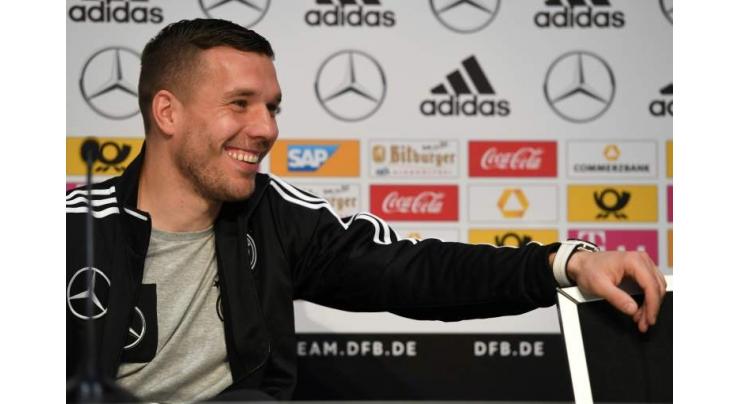 Football: Podolski captains Germany on farewell against England 