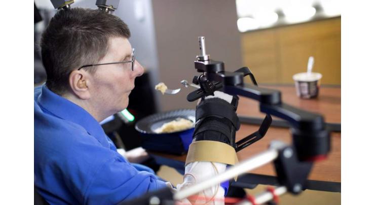 Quadriplegic man regains use of arm in medical first: study 