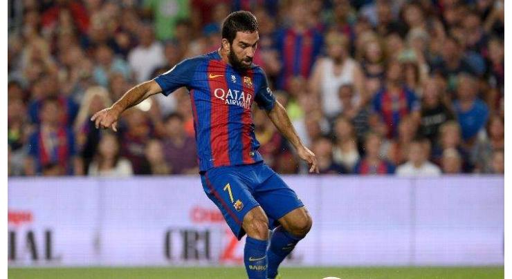 Football: Barca's Turan out for three weeks 