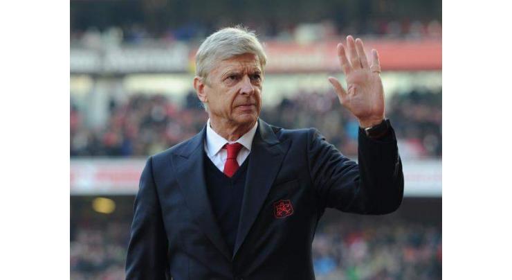Football: Wenger plans ahead but won't reveal future 