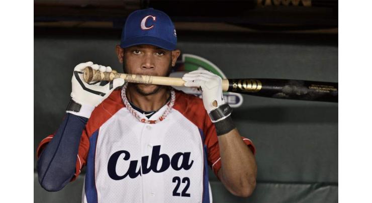 Cubans jailed for taking baseball players to US: media 
