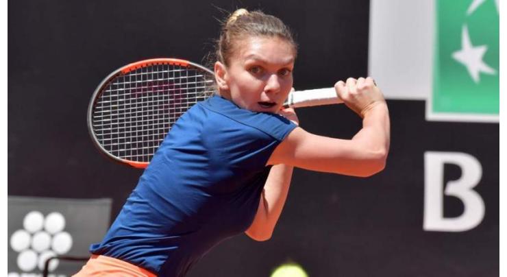 Tennis: Injured Halep 50/50 for French Open 