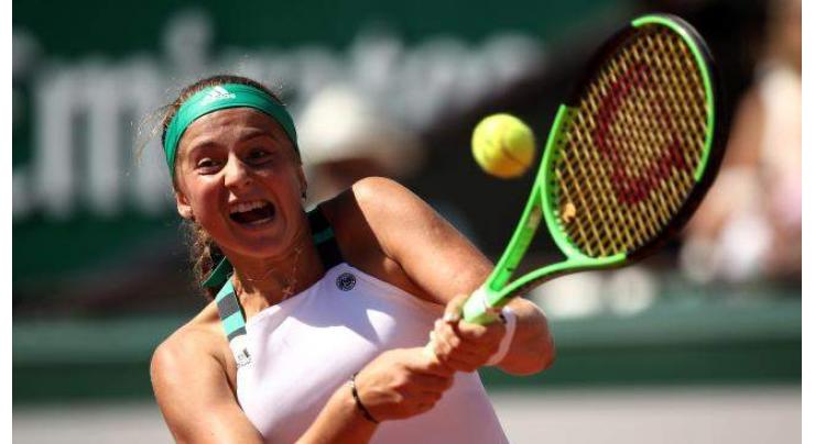 Tennis: Ostapenko stuns Halep to win French Open 
