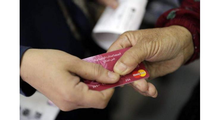UN refugee cash card scheme boosts Lebanese grocers 