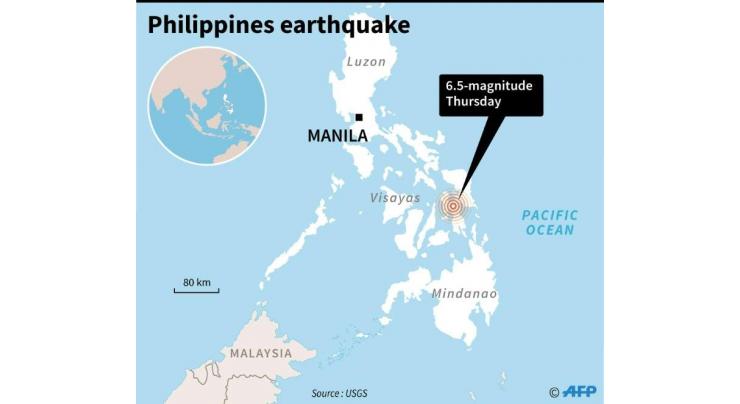 One dead as strong quake hits central Philippine island: official 