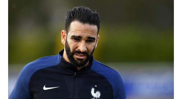 France defender Rami joins Marseille 