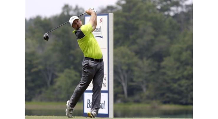 Golf: Collins shoots 60 to surge into Barbasol lead 