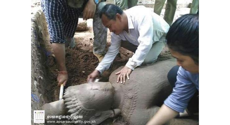 Archeologists find large ancient statue at Cambodia's Angkor complex 