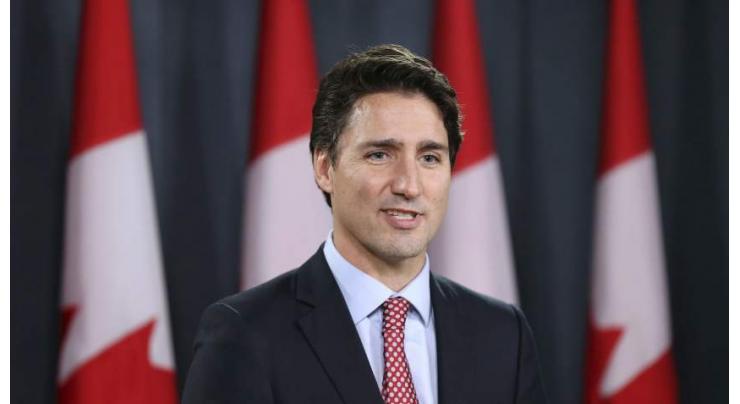Canada PM says 'strong system' can handle migrant influx 