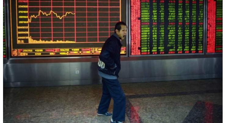 Hong Kong falls, Shanghai stocks finish flat 