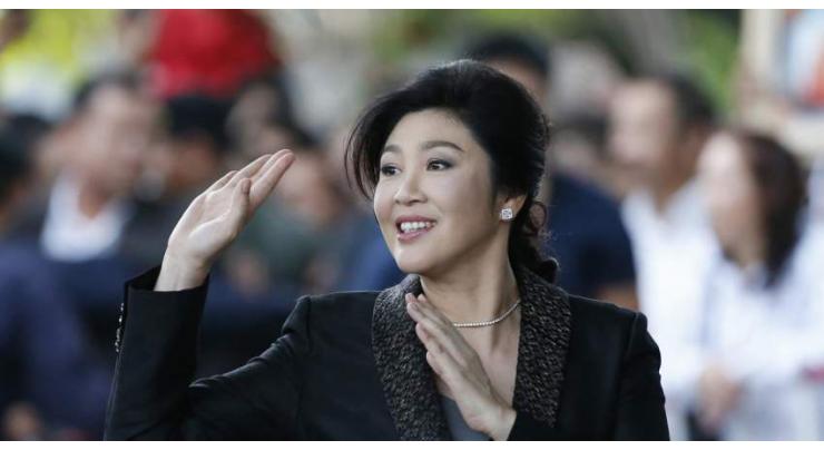 Thai ex-PM Yingluck skips court, arrest warrant issued 