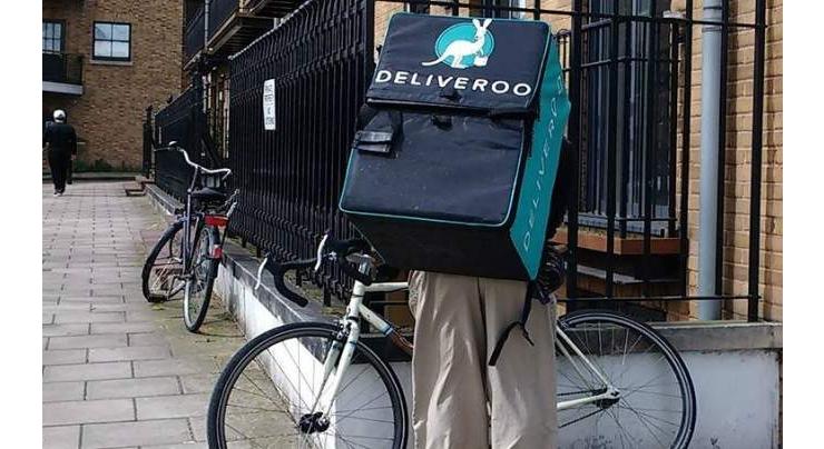 French Deliveroo takeaway food riders protest over pay 