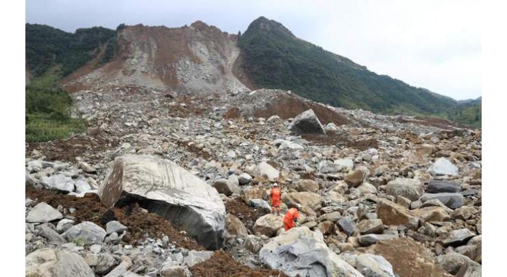 Two dead, 25 missing in China landslide 