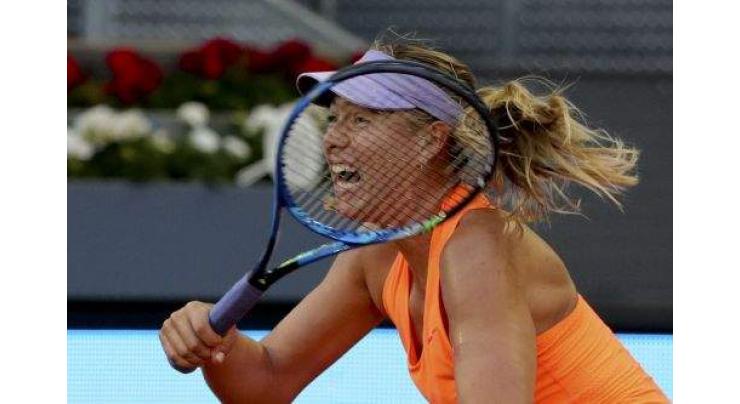 Tennis: Muguruza advances as Sharapova awaits US Open spotlight 