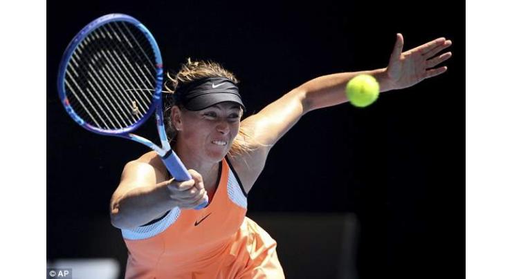 Tennis: Tearful Sharapova downs Halep in thrilling US Open return 