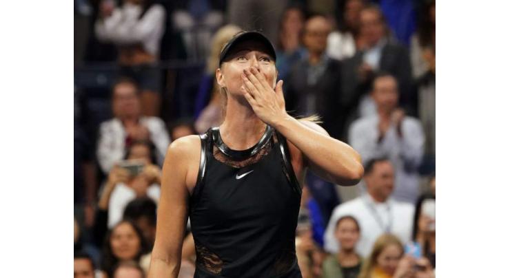 Tennis: Sharapova wins Slam return, ousts Halep at US Open 