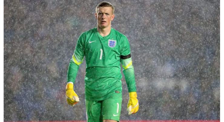 Football: Goalkeeper Pickford out of England squad 